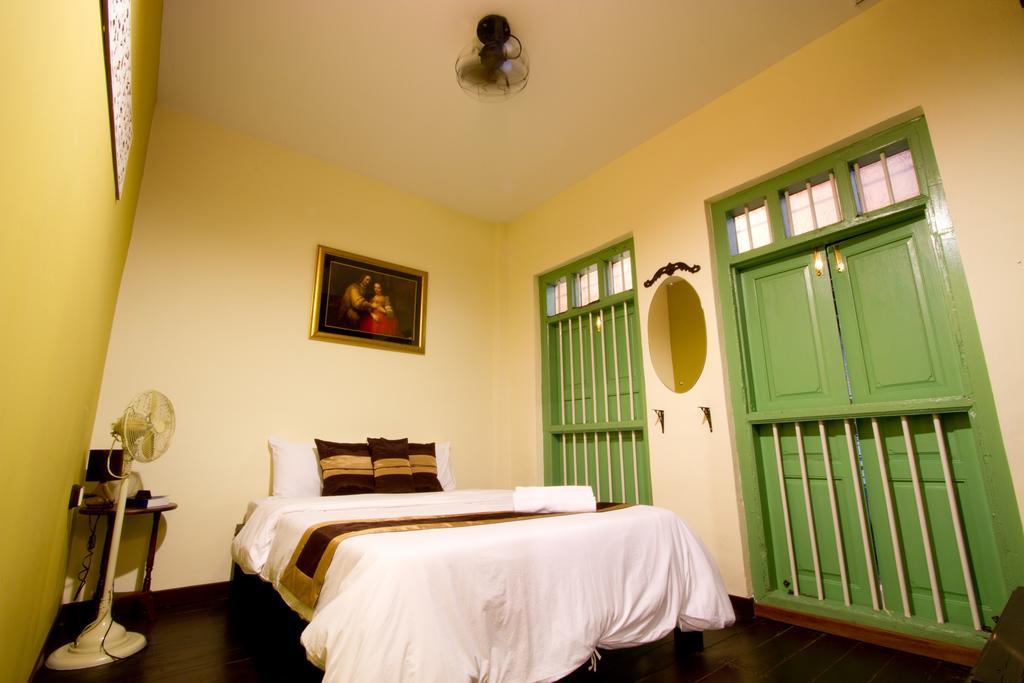 Luang Poj Boutique Hostel Ranong Quarto foto