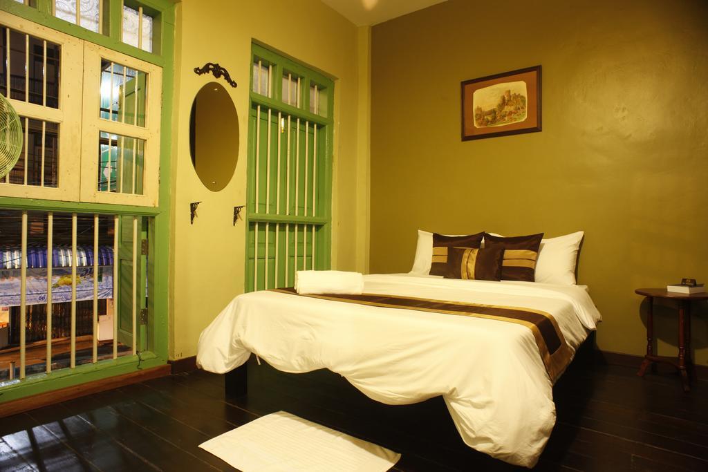 Luang Poj Boutique Hostel Ranong Quarto foto