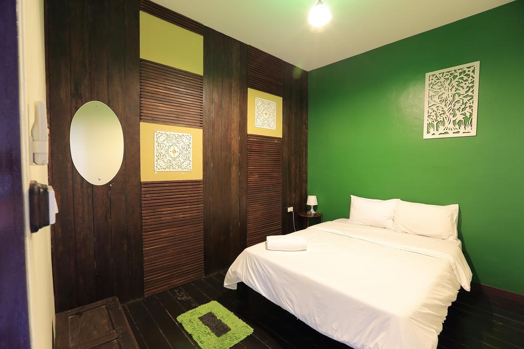 Luang Poj Boutique Hostel Ranong Quarto foto