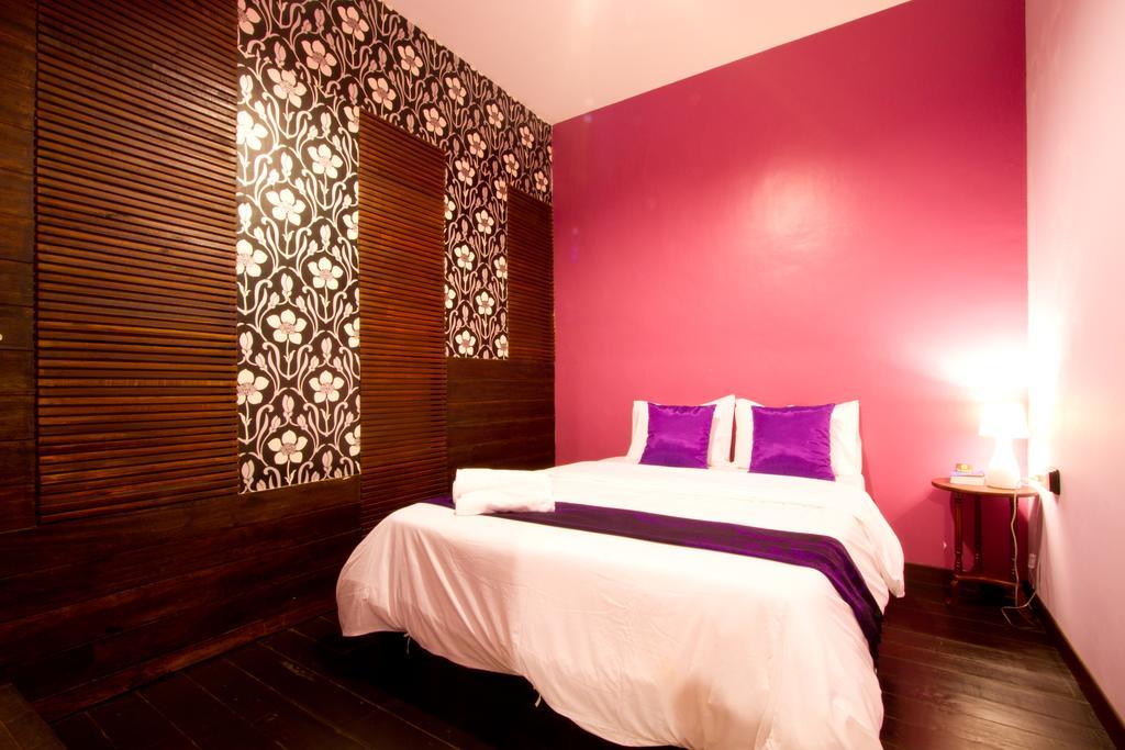 Luang Poj Boutique Hostel Ranong Quarto foto